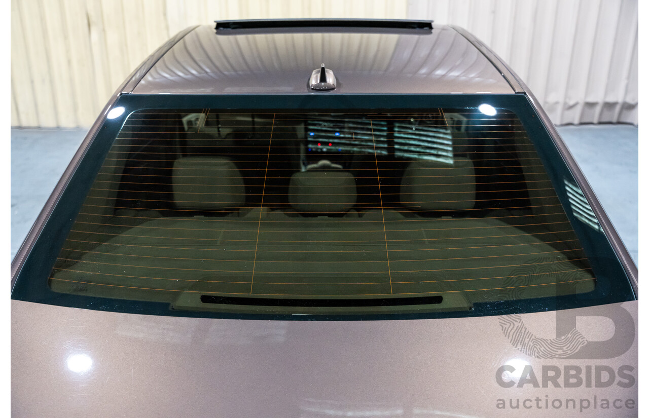 9/2013 Mercedes Benz E300 Bluetec Hybrid 212 MY13 4d Sedan Dolomite Brown Metallic Turbo Diesel 2.1L - Hybrid