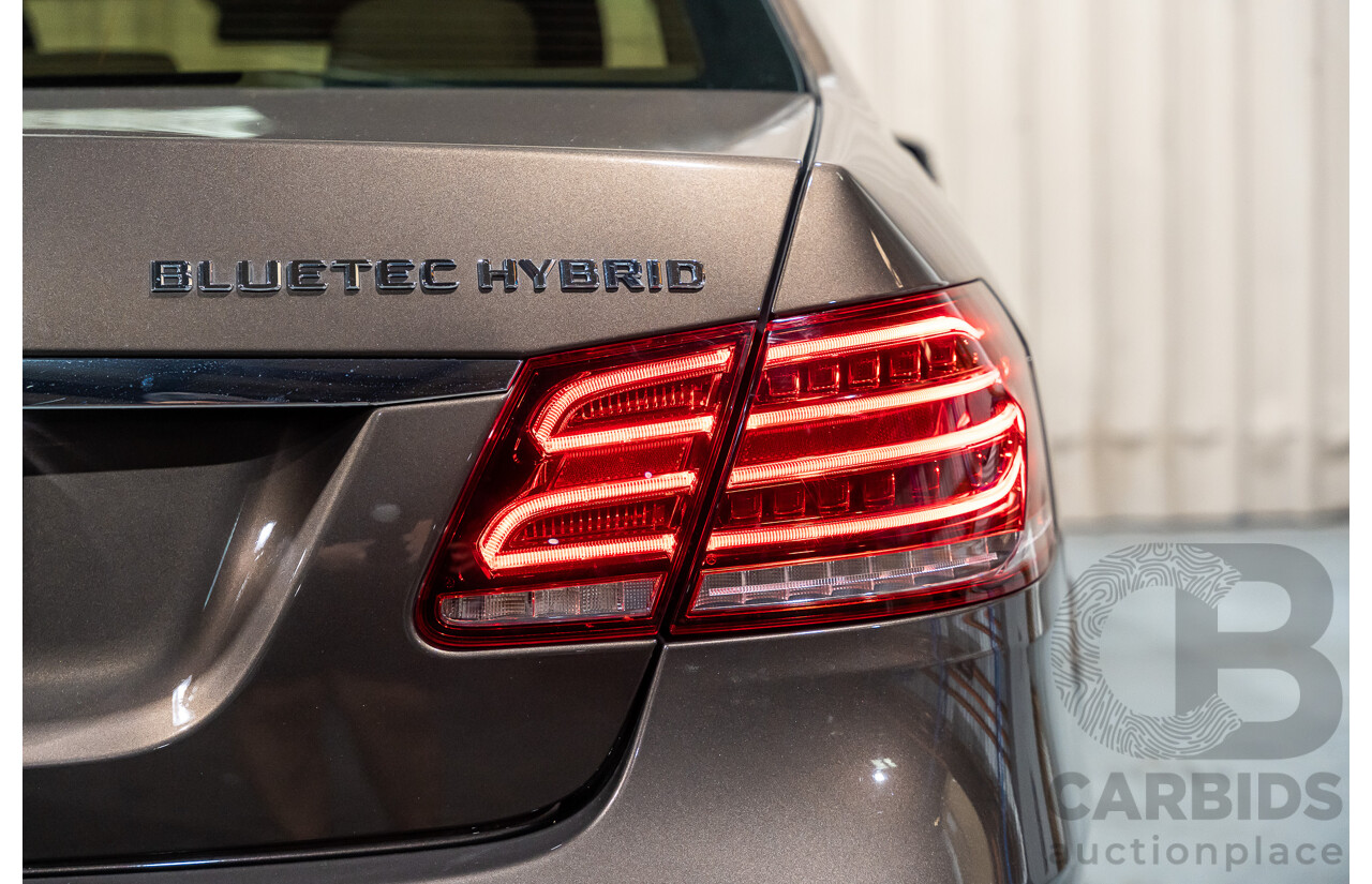 9/2013 Mercedes Benz E300 Bluetec Hybrid 212 MY13 4d Sedan Dolomite Brown Metallic Turbo Diesel 2.1L - Hybrid