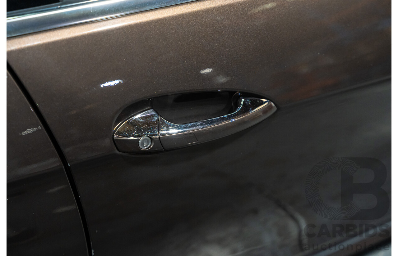 9/2013 Mercedes Benz E300 Bluetec Hybrid 212 MY13 4d Sedan Dolomite Brown Metallic Turbo Diesel 2.1L - Hybrid