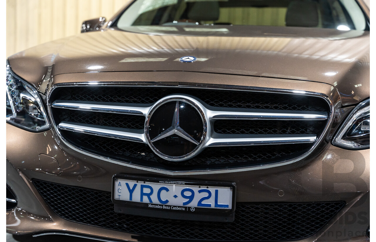 9/2013 Mercedes Benz E300 Bluetec Hybrid 212 MY13 4d Sedan Dolomite Brown Metallic Turbo Diesel 2.1L - Hybrid