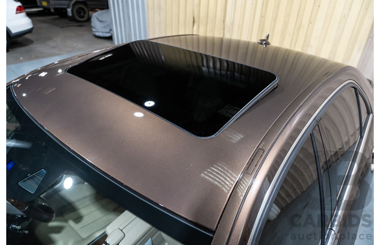 9/2013 Mercedes Benz E300 Bluetec Hybrid 212 MY13 4d Sedan Dolomite Brown Metallic Turbo Diesel 2.1L - Hybrid