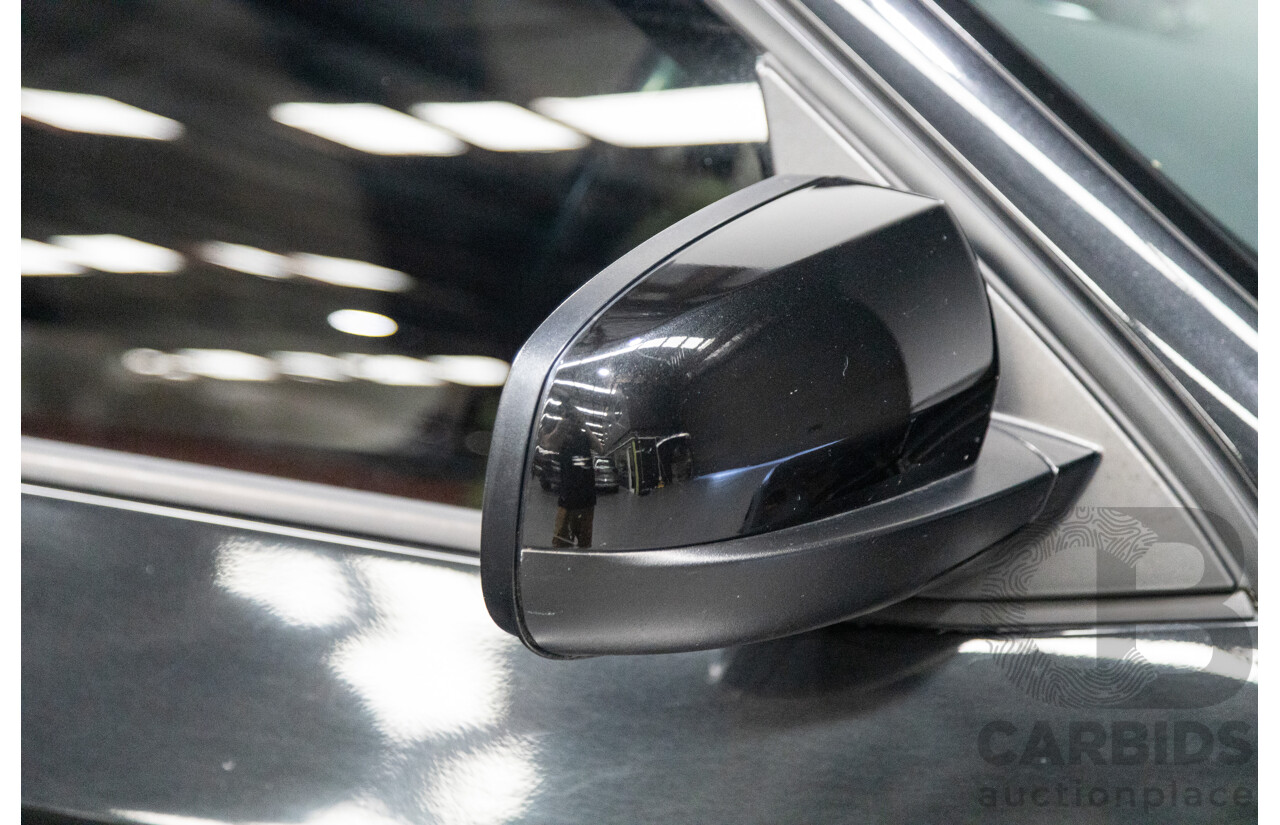 10/2010 BMW X5 xDrive30d (4x4) E70 MY10 4D Wagon Metallic Black Turbo Diesel 3.0L