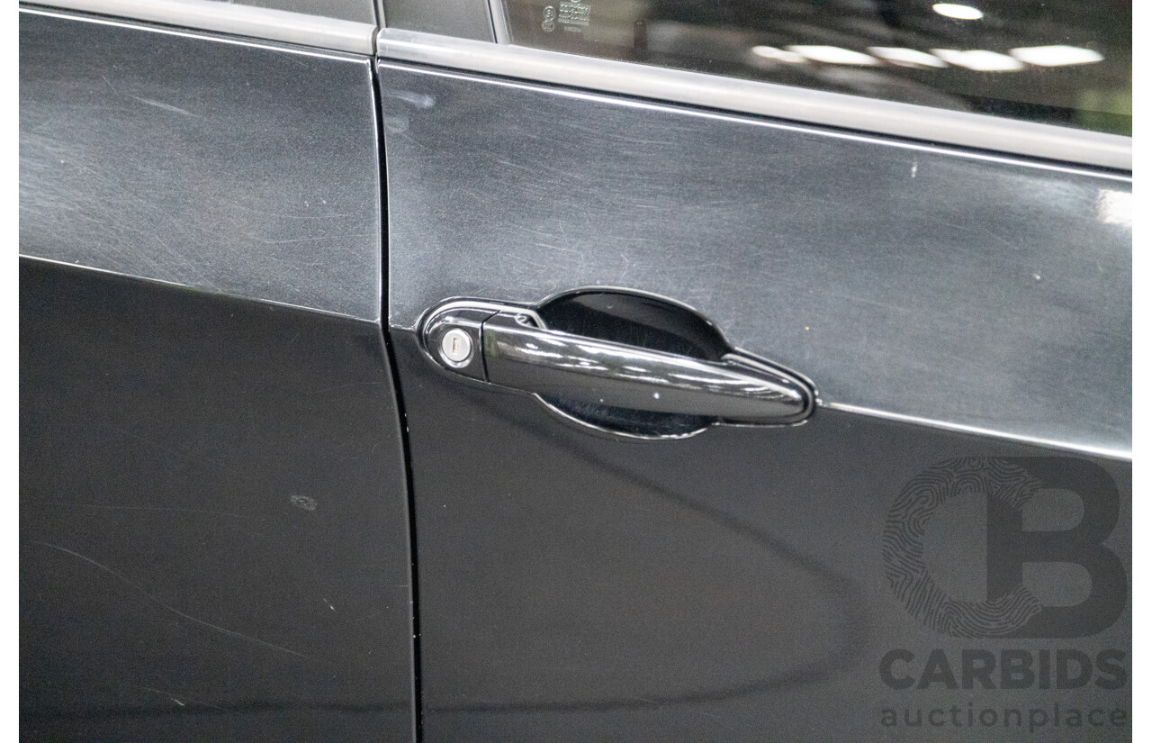 10/2010 BMW X5 xDrive30d (4x4) E70 MY10 4D Wagon Metallic Black Turbo Diesel 3.0L