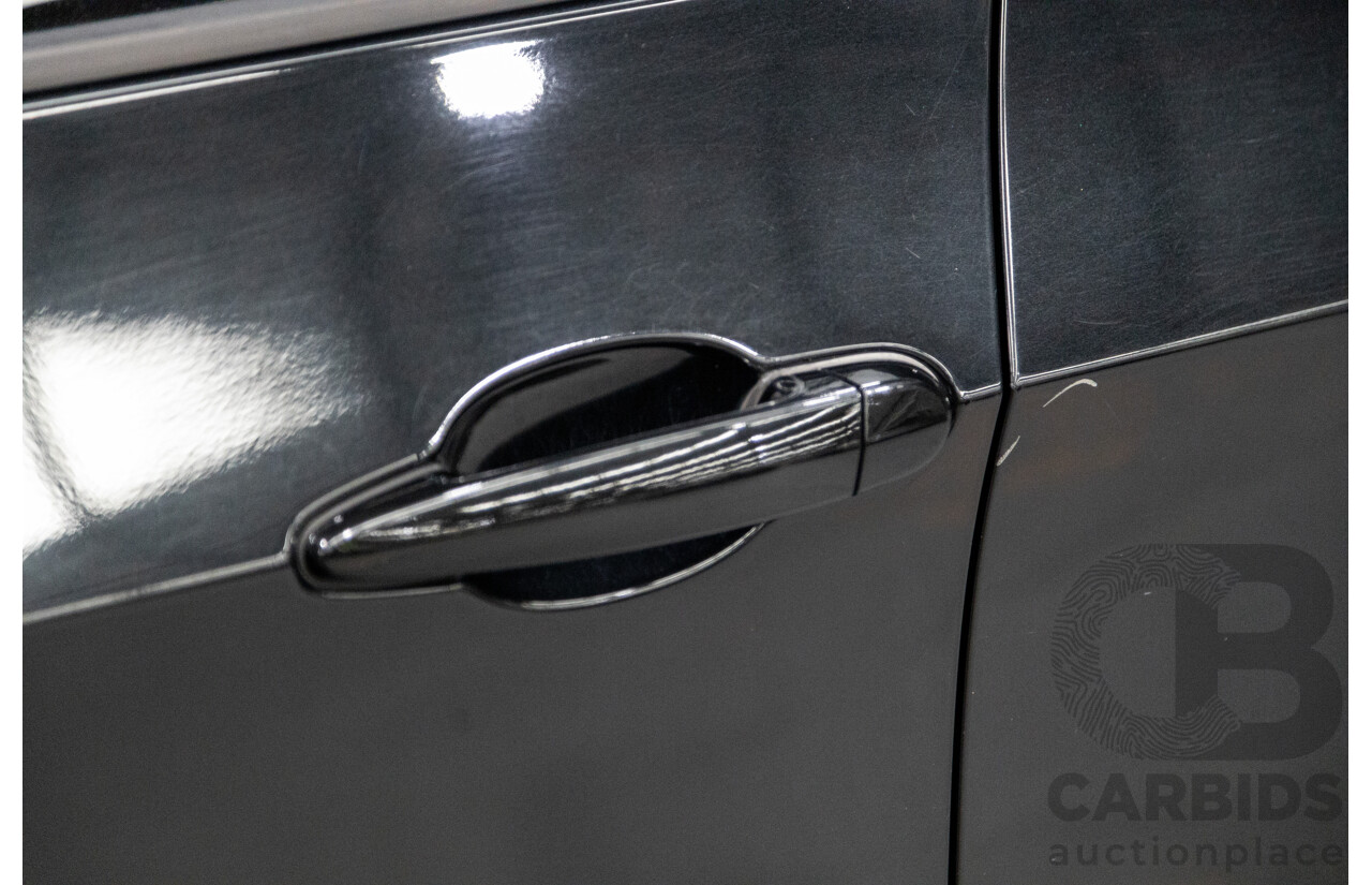 10/2010 BMW X5 xDrive30d (4x4) E70 MY10 4D Wagon Metallic Black Turbo Diesel 3.0L