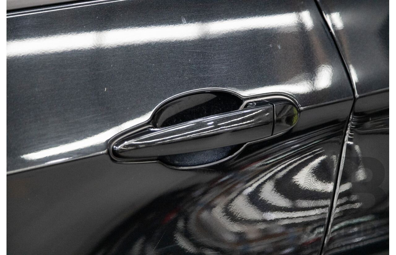 10/2010 BMW X5 xDrive30d (4x4) E70 MY10 4D Wagon Metallic Black Turbo Diesel 3.0L