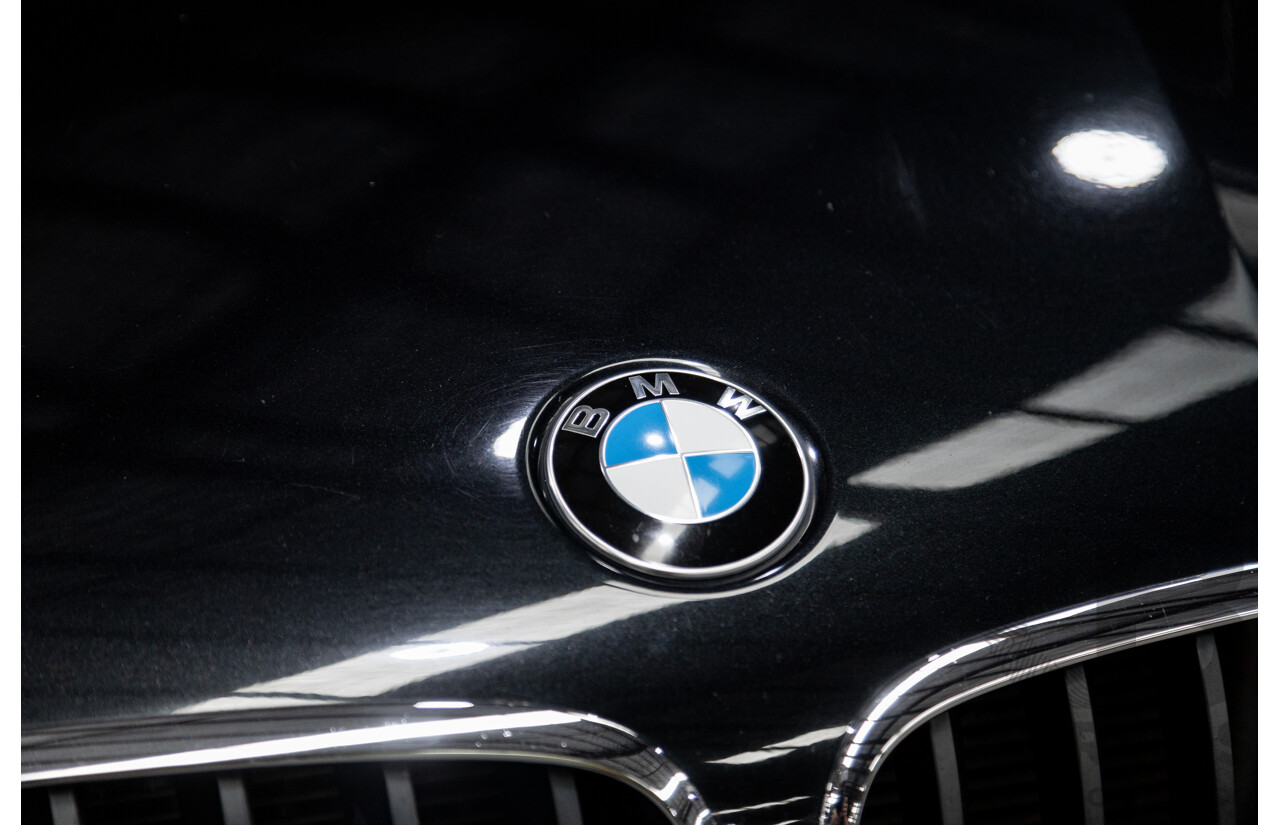 10/2010 BMW X5 xDrive30d (4x4) E70 MY10 4D Wagon Metallic Black Turbo Diesel 3.0L
