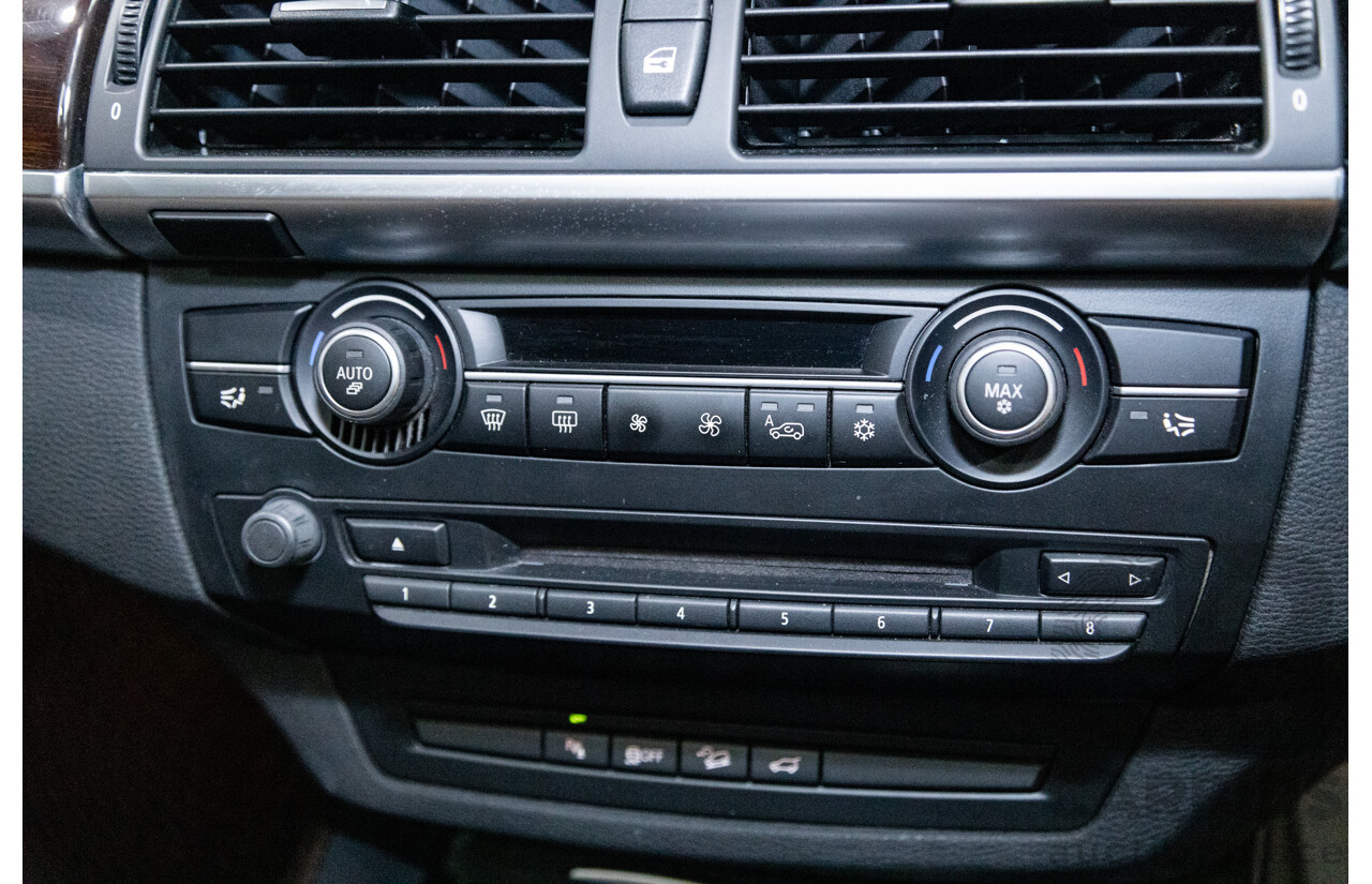 10/2010 BMW X5 xDrive30d (4x4) E70 MY10 4D Wagon Metallic Black Turbo Diesel 3.0L