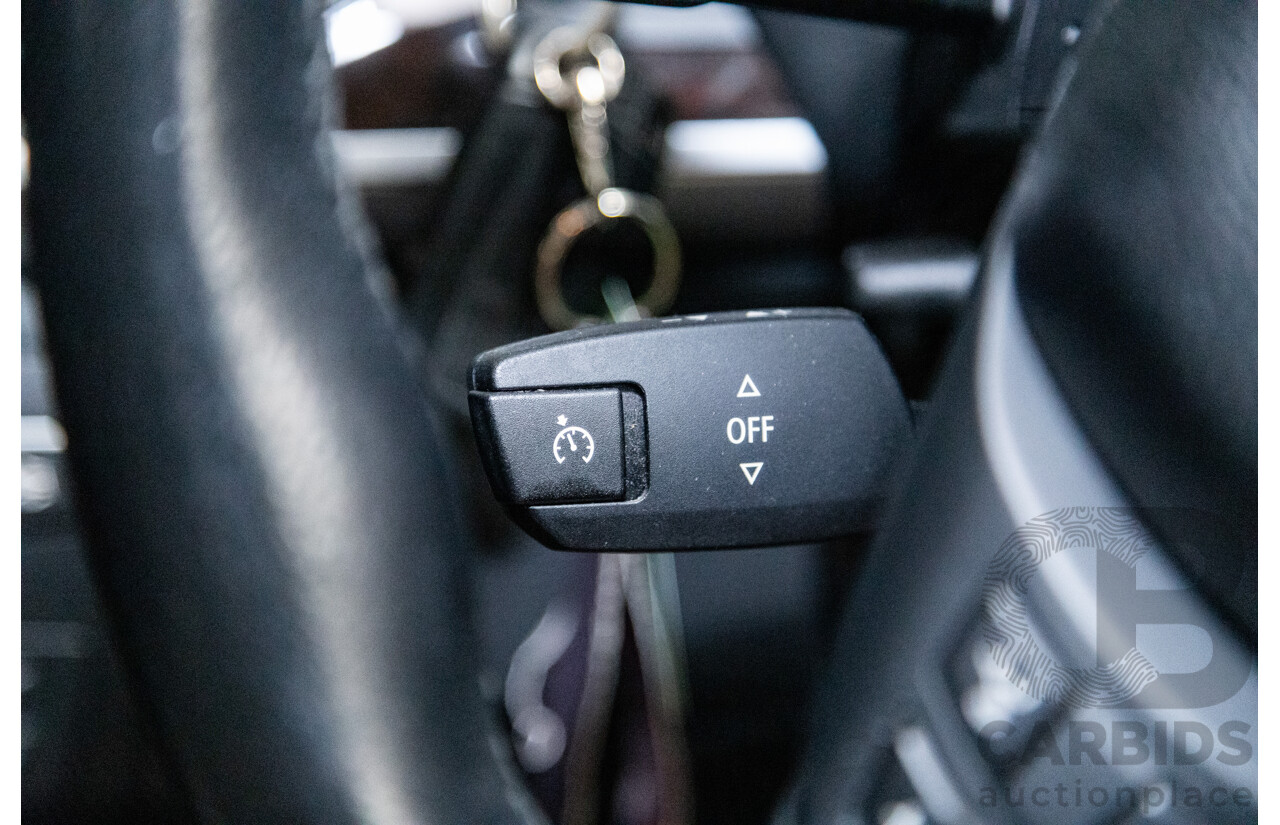 10/2010 BMW X5 xDrive30d (4x4) E70 MY10 4D Wagon Metallic Black Turbo Diesel 3.0L