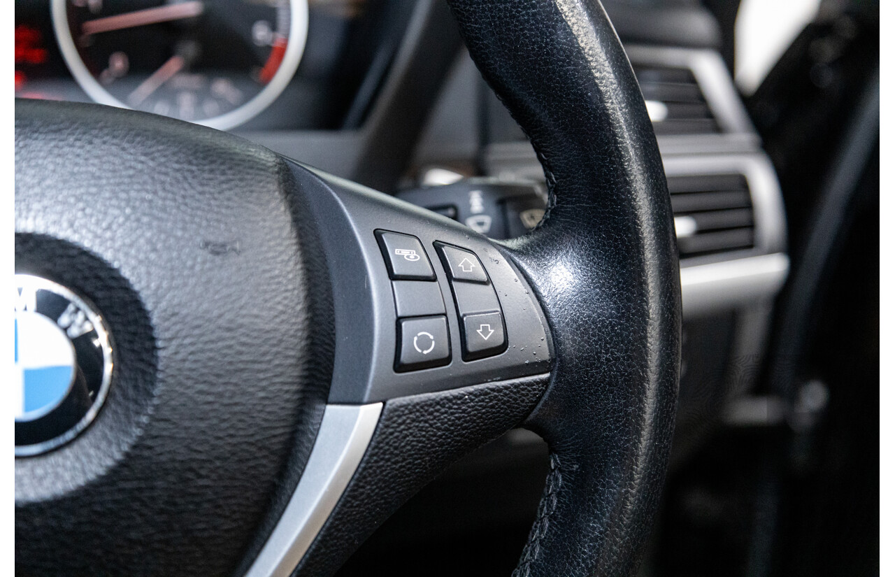 10/2010 BMW X5 xDrive30d (4x4) E70 MY10 4D Wagon Metallic Black Turbo Diesel 3.0L