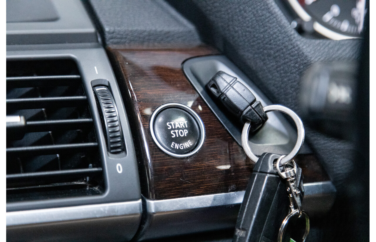 10/2010 BMW X5 xDrive30d (4x4) E70 MY10 4D Wagon Metallic Black Turbo Diesel 3.0L