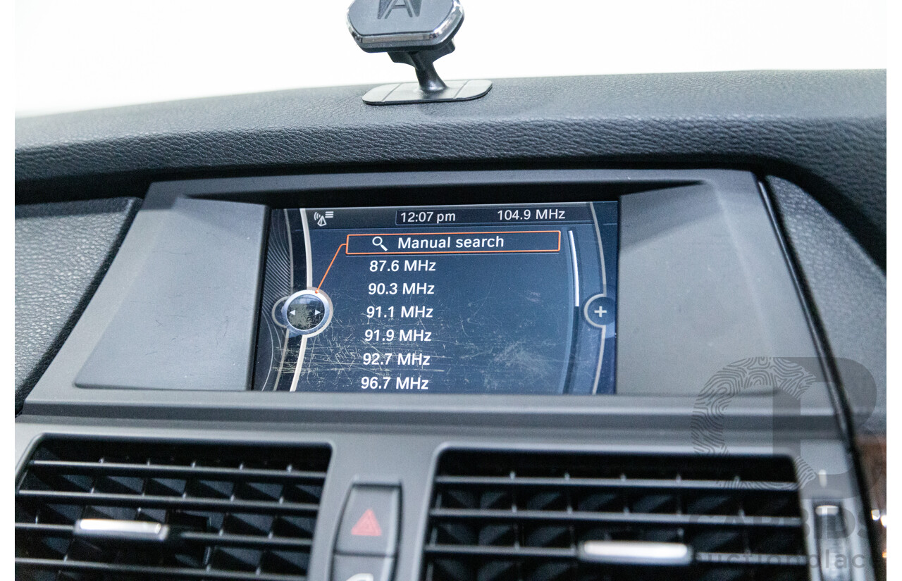 10/2010 BMW X5 xDrive30d (4x4) E70 MY10 4D Wagon Metallic Black Turbo Diesel 3.0L