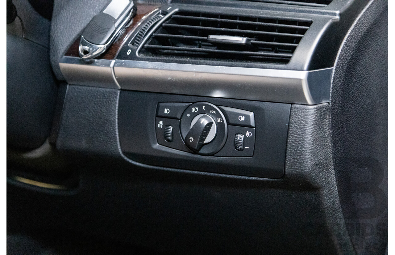 10/2010 BMW X5 xDrive30d (4x4) E70 MY10 4D Wagon Metallic Black Turbo Diesel 3.0L