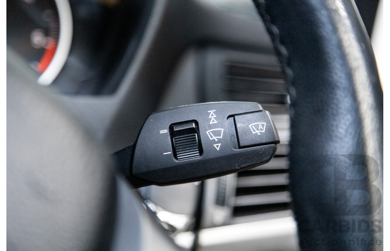 10/2010 BMW X5 xDrive30d (4x4) E70 MY10 4D Wagon Metallic Black Turbo Diesel 3.0L