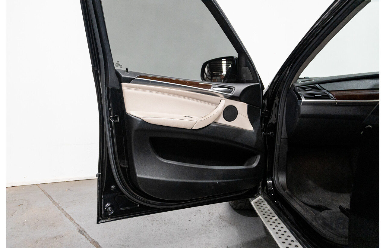 10/2010 BMW X5 xDrive30d (4x4) E70 MY10 4D Wagon Metallic Black Turbo Diesel 3.0L