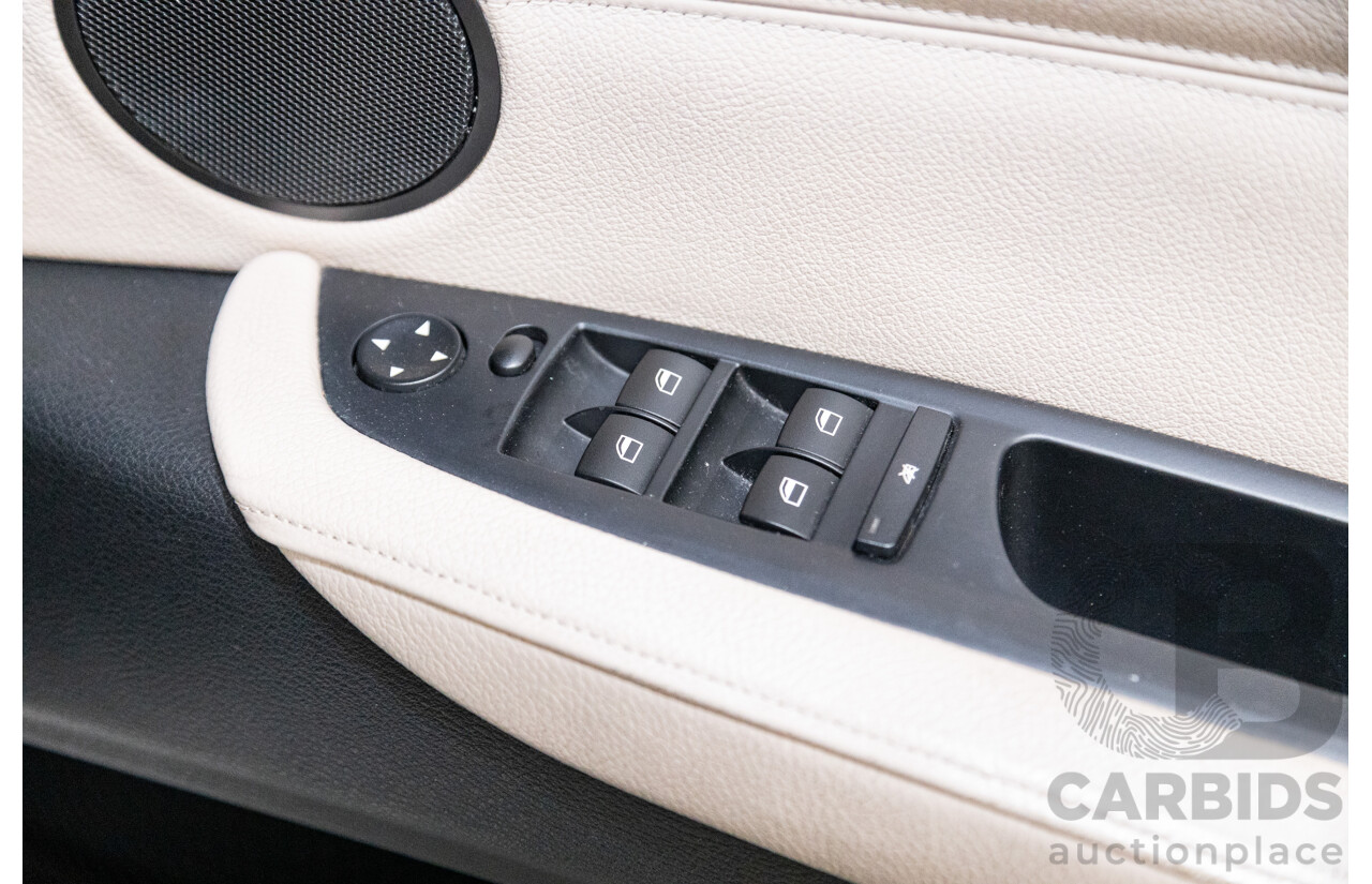 10/2010 BMW X5 xDrive30d (4x4) E70 MY10 4D Wagon Metallic Black Turbo Diesel 3.0L