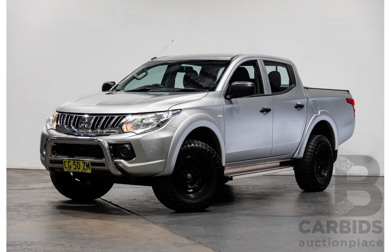 10/2015 Mitsubishi Triton GLX (4x4) MQ MY16 Dual Cab Utility Metallic Silver Turbo Diesel 2.4L