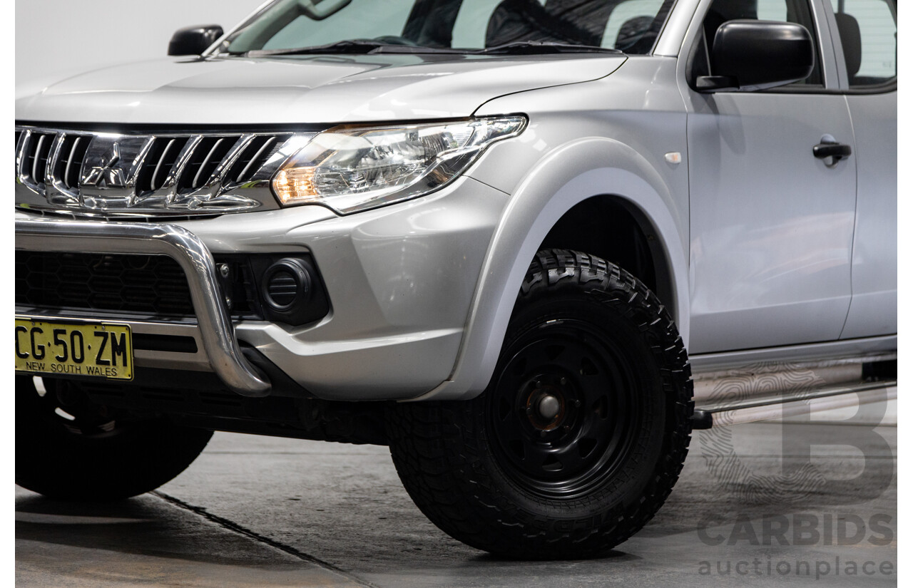 10/2015 Mitsubishi Triton GLX (4x4) MQ MY16 Dual Cab Utility Metallic Silver Turbo Diesel 2.4L