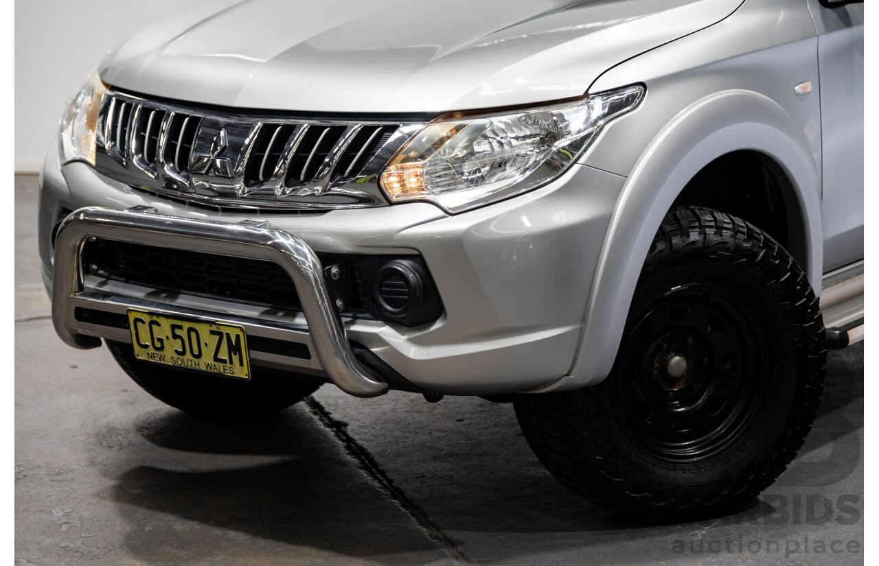 10/2015 Mitsubishi Triton GLX (4x4) MQ MY16 Dual Cab Utility Metallic Silver Turbo Diesel 2.4L