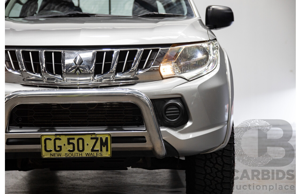 10/2015 Mitsubishi Triton GLX (4x4) MQ MY16 Dual Cab Utility Metallic Silver Turbo Diesel 2.4L