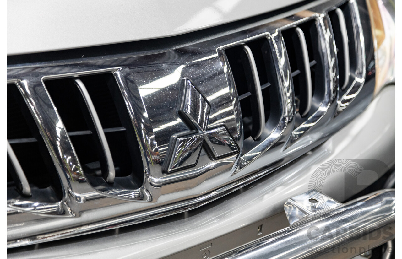 10/2015 Mitsubishi Triton GLX (4x4) MQ MY16 Dual Cab Utility Metallic Silver Turbo Diesel 2.4L