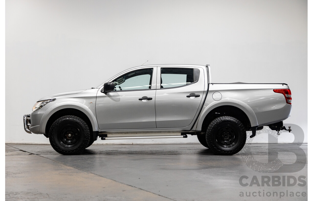 10/2015 Mitsubishi Triton GLX (4x4) MQ MY16 Dual Cab Utility Metallic Silver Turbo Diesel 2.4L