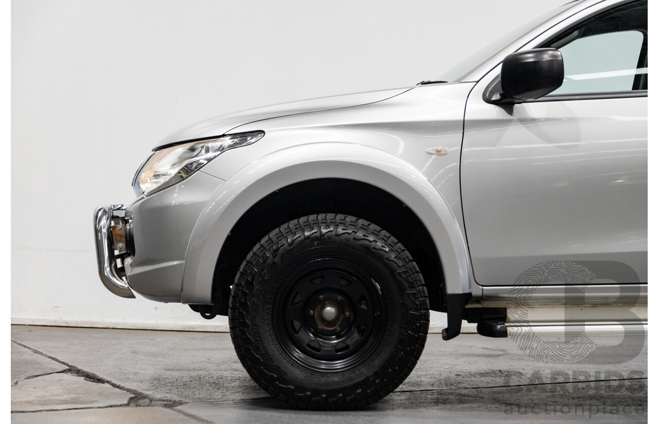 10/2015 Mitsubishi Triton GLX (4x4) MQ MY16 Dual Cab Utility Metallic Silver Turbo Diesel 2.4L