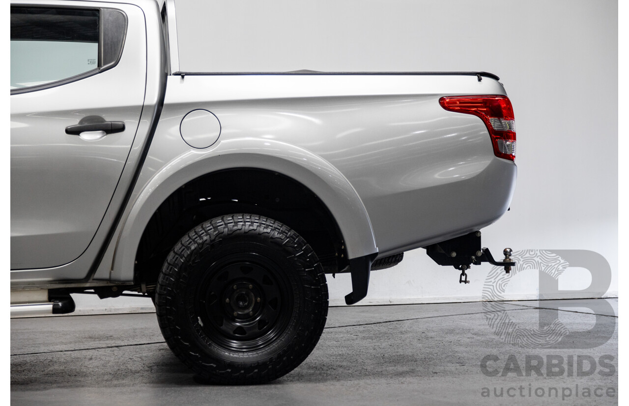 10/2015 Mitsubishi Triton GLX (4x4) MQ MY16 Dual Cab Utility Metallic Silver Turbo Diesel 2.4L