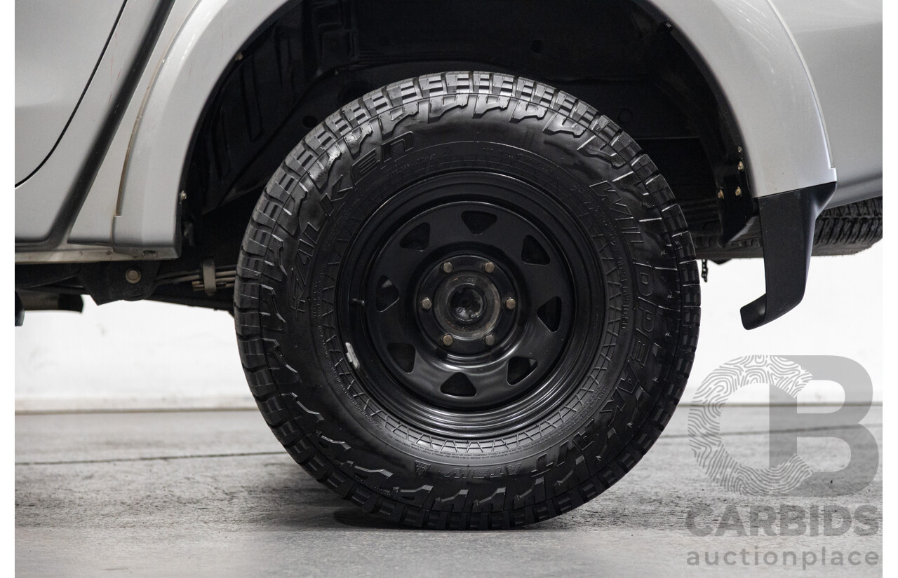 10/2015 Mitsubishi Triton GLX (4x4) MQ MY16 Dual Cab Utility Metallic Silver Turbo Diesel 2.4L