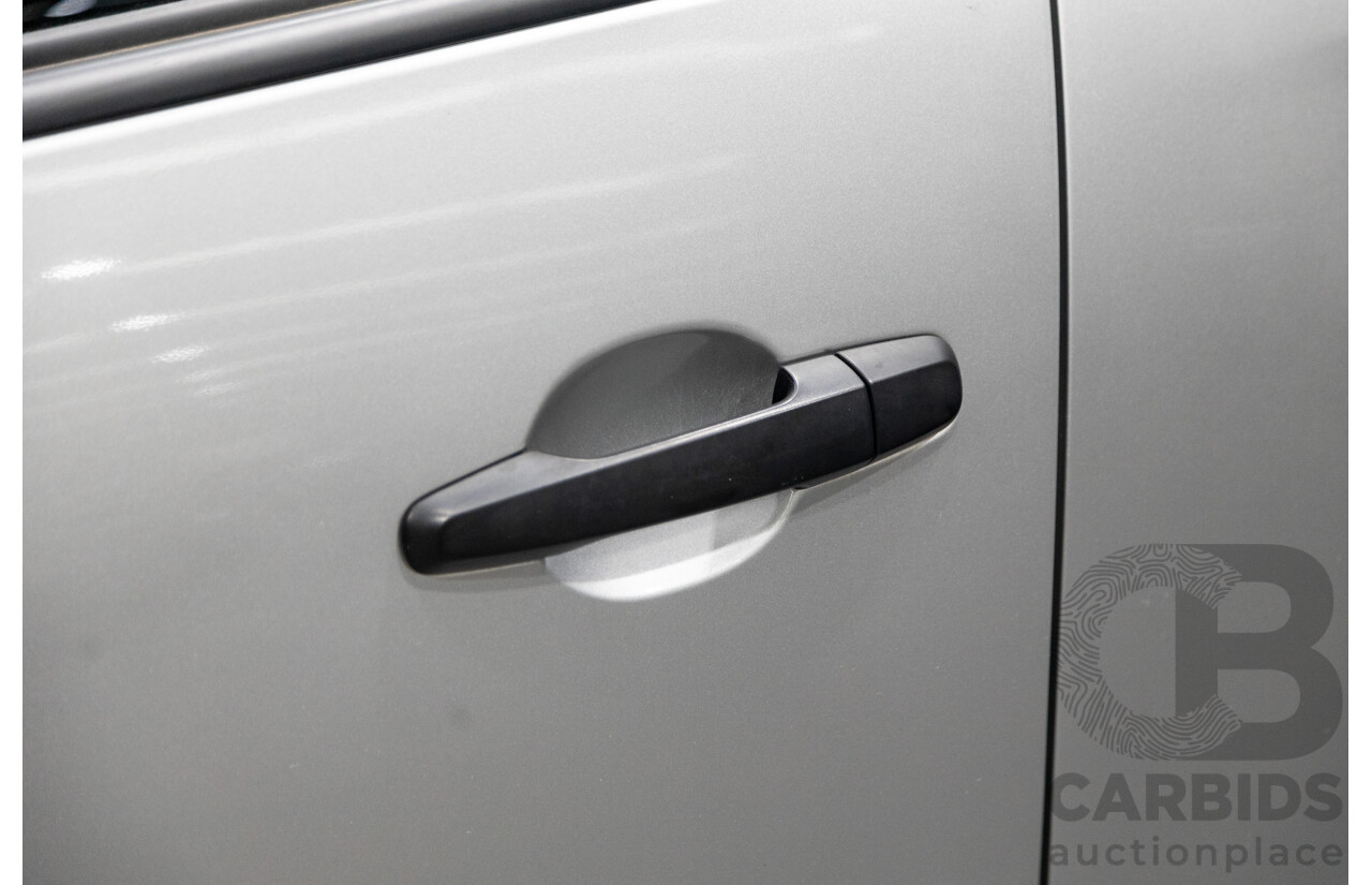 10/2015 Mitsubishi Triton GLX (4x4) MQ MY16 Dual Cab Utility Metallic Silver Turbo Diesel 2.4L