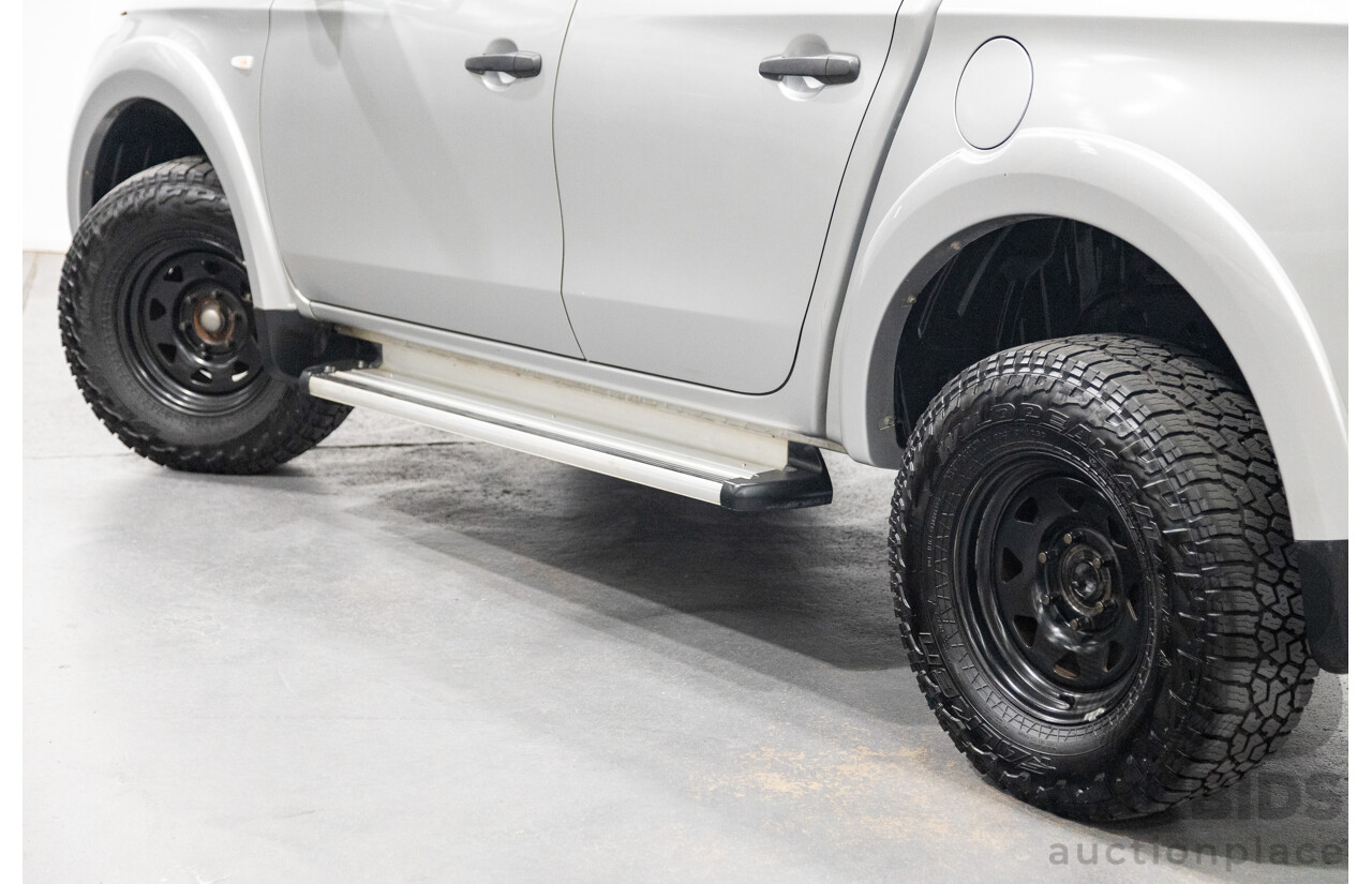 10/2015 Mitsubishi Triton GLX (4x4) MQ MY16 Dual Cab Utility Metallic Silver Turbo Diesel 2.4L