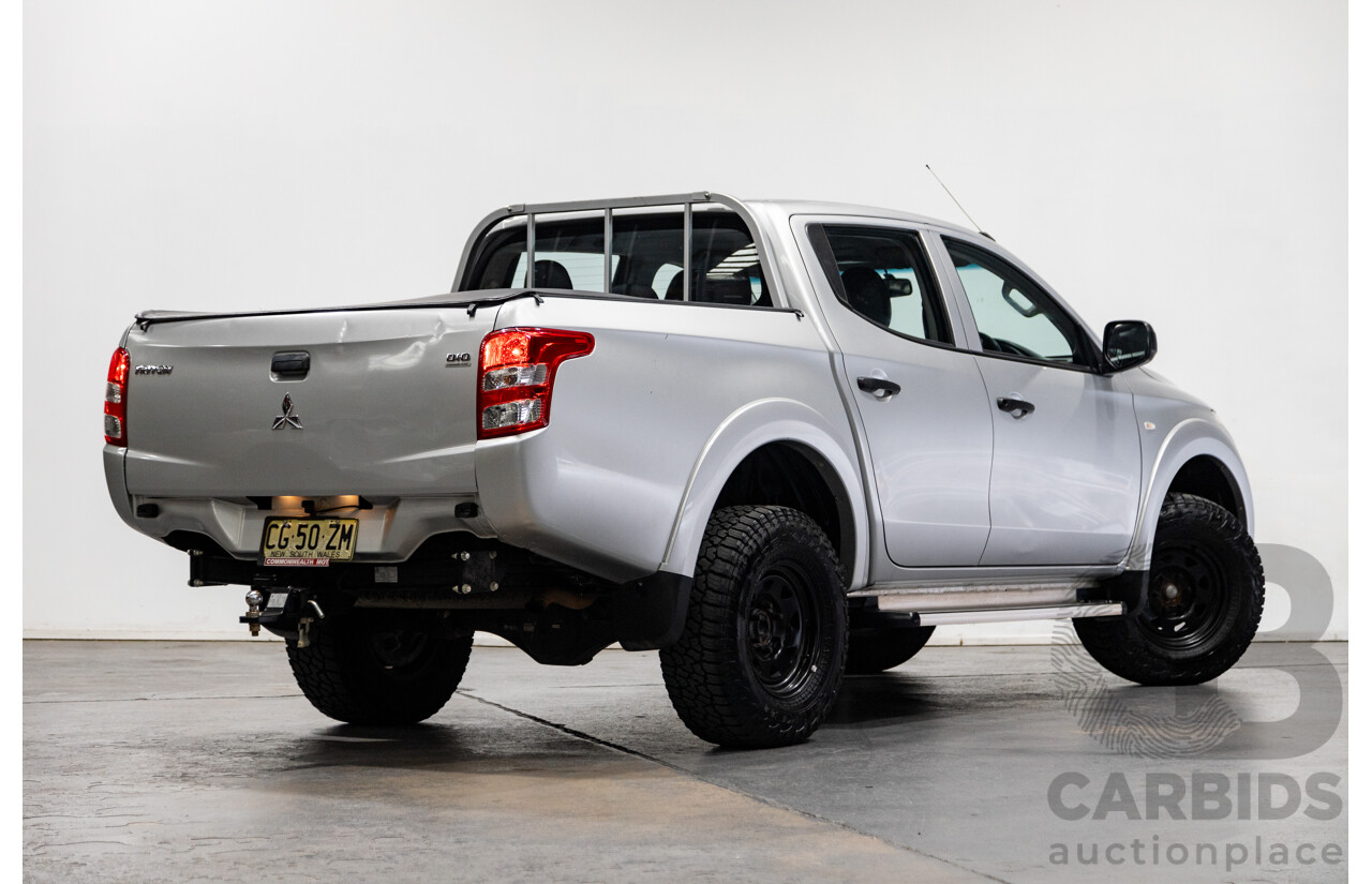 10/2015 Mitsubishi Triton GLX (4x4) MQ MY16 Dual Cab Utility Metallic Silver Turbo Diesel 2.4L
