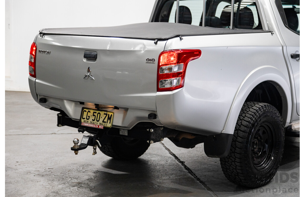 10/2015 Mitsubishi Triton GLX (4x4) MQ MY16 Dual Cab Utility Metallic Silver Turbo Diesel 2.4L