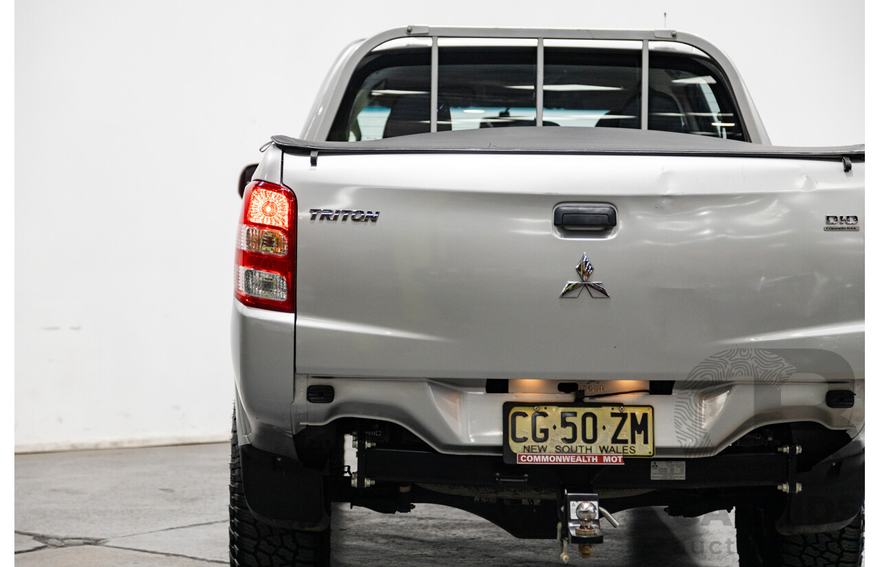 10/2015 Mitsubishi Triton GLX (4x4) MQ MY16 Dual Cab Utility Metallic Silver Turbo Diesel 2.4L