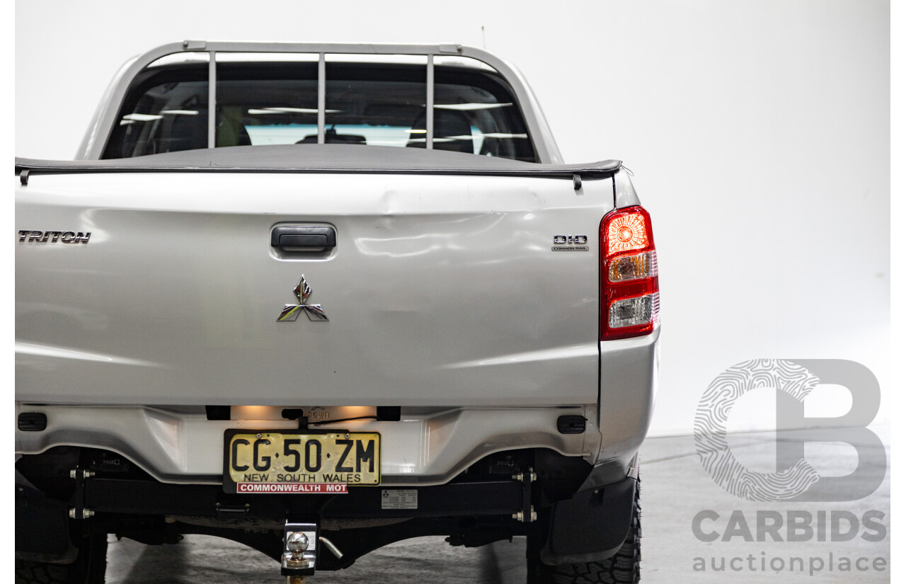 10/2015 Mitsubishi Triton GLX (4x4) MQ MY16 Dual Cab Utility Metallic Silver Turbo Diesel 2.4L