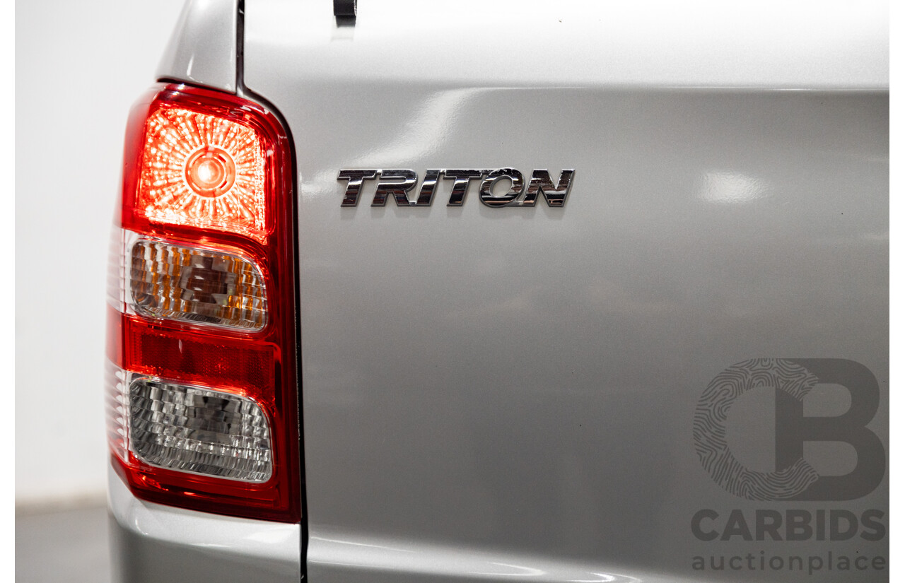 10/2015 Mitsubishi Triton GLX (4x4) MQ MY16 Dual Cab Utility Metallic Silver Turbo Diesel 2.4L