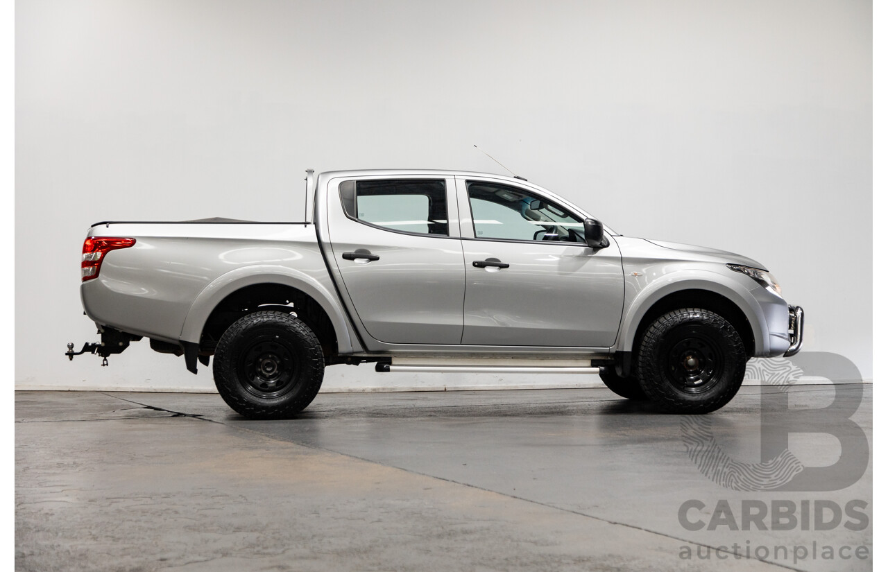 10/2015 Mitsubishi Triton GLX (4x4) MQ MY16 Dual Cab Utility Metallic Silver Turbo Diesel 2.4L
