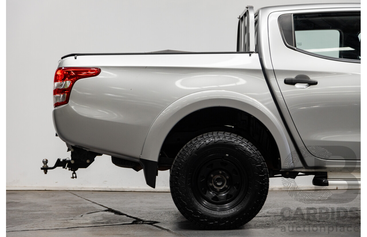 10/2015 Mitsubishi Triton GLX (4x4) MQ MY16 Dual Cab Utility Metallic Silver Turbo Diesel 2.4L