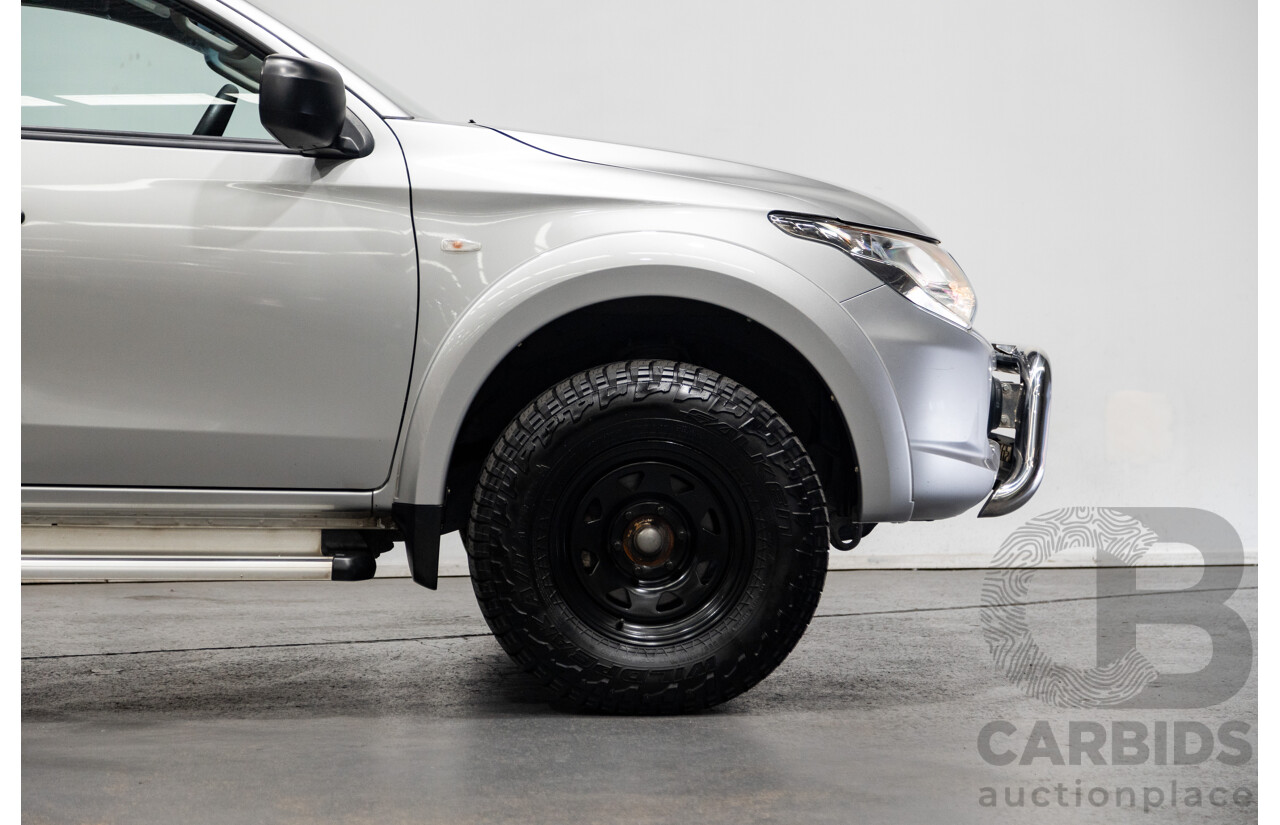10/2015 Mitsubishi Triton GLX (4x4) MQ MY16 Dual Cab Utility Metallic Silver Turbo Diesel 2.4L