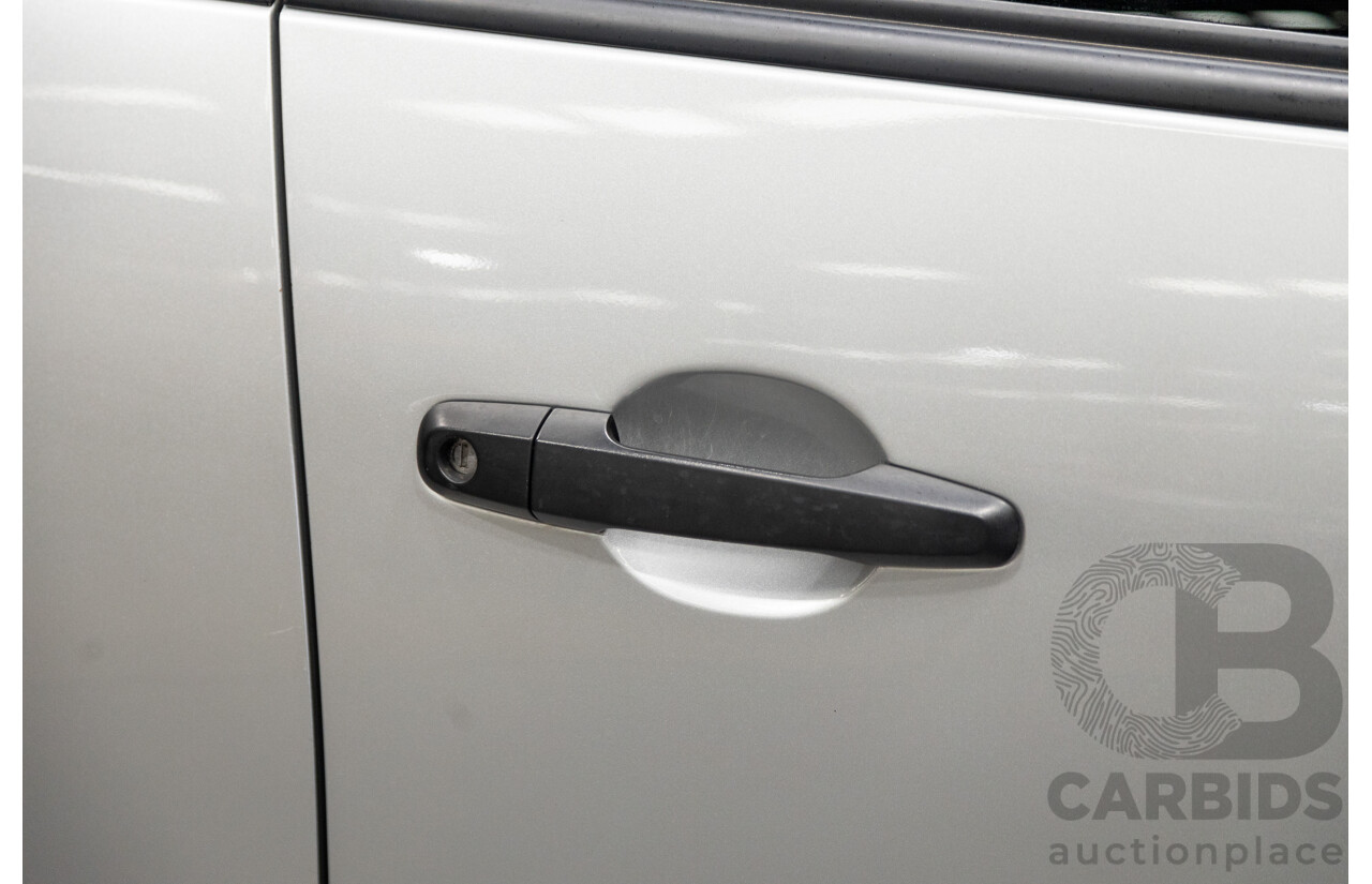 10/2015 Mitsubishi Triton GLX (4x4) MQ MY16 Dual Cab Utility Metallic Silver Turbo Diesel 2.4L