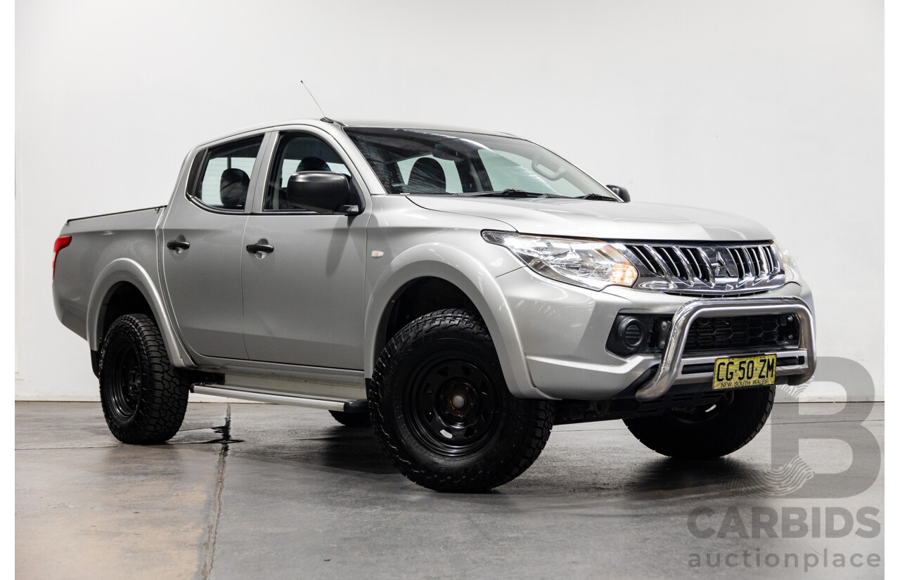 10/2015 Mitsubishi Triton GLX (4x4) MQ MY16 Dual Cab Utility Metallic Silver Turbo Diesel 2.4L
