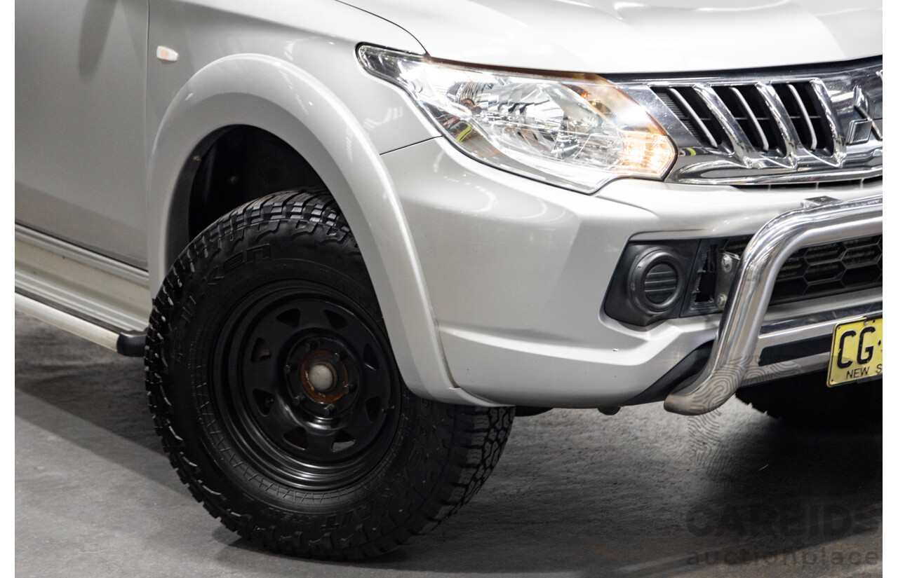 10/2015 Mitsubishi Triton GLX (4x4) MQ MY16 Dual Cab Utility Metallic Silver Turbo Diesel 2.4L