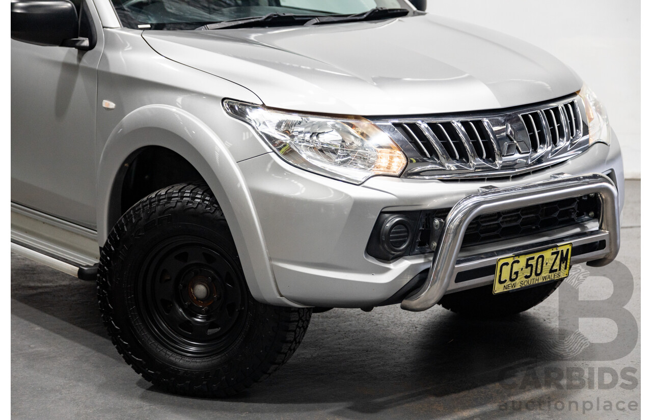 10/2015 Mitsubishi Triton GLX (4x4) MQ MY16 Dual Cab Utility Metallic Silver Turbo Diesel 2.4L