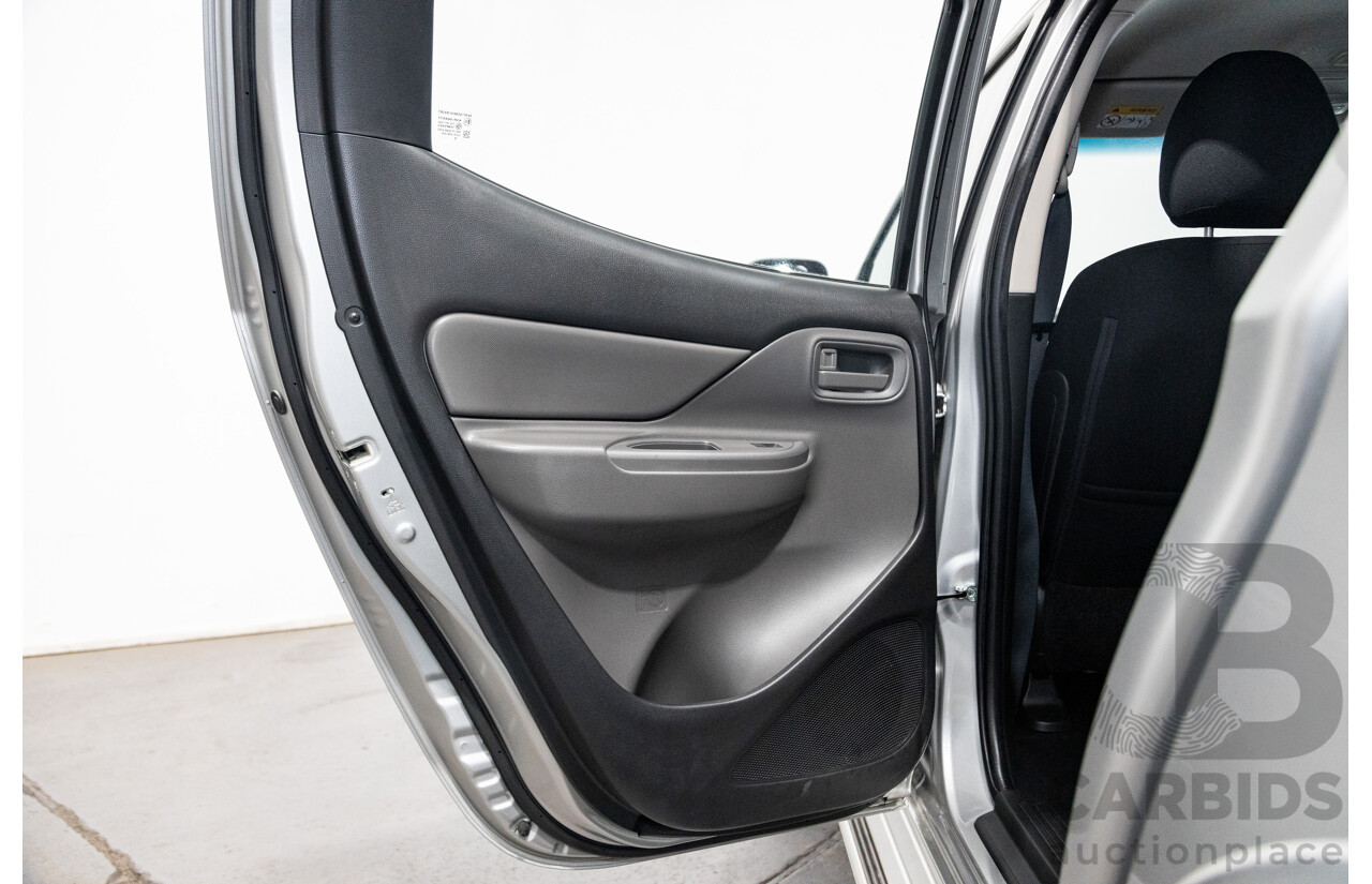 10/2015 Mitsubishi Triton GLX (4x4) MQ MY16 Dual Cab Utility Metallic Silver Turbo Diesel 2.4L