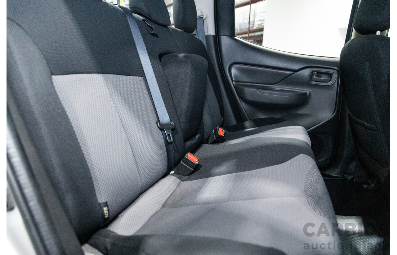 10/2015 Mitsubishi Triton GLX (4x4) MQ MY16 Dual Cab Utility Metallic Silver Turbo Diesel 2.4L