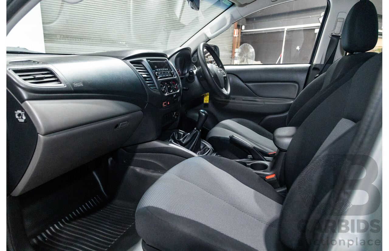 10/2015 Mitsubishi Triton GLX (4x4) MQ MY16 Dual Cab Utility Metallic Silver Turbo Diesel 2.4L