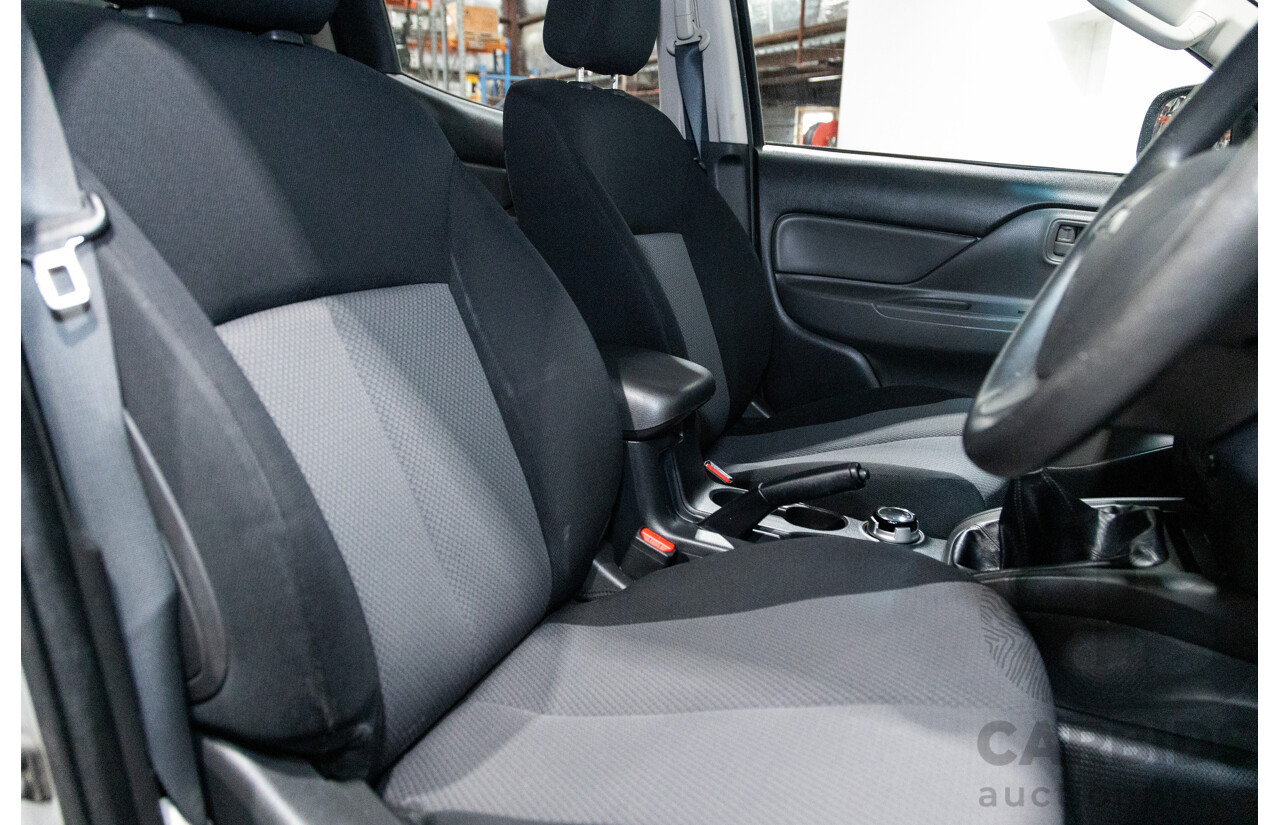 10/2015 Mitsubishi Triton GLX (4x4) MQ MY16 Dual Cab Utility Metallic Silver Turbo Diesel 2.4L