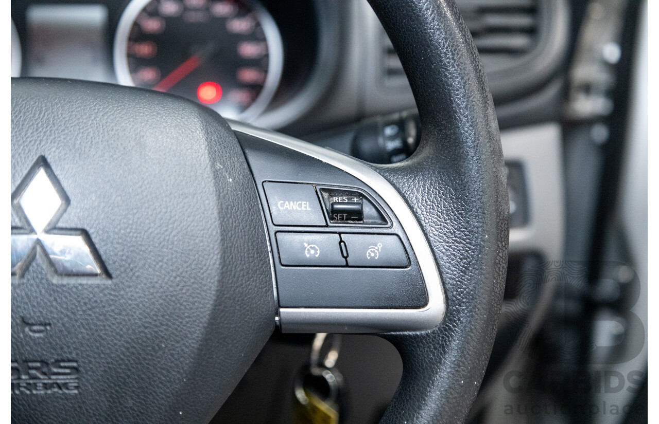 10/2015 Mitsubishi Triton GLX (4x4) MQ MY16 Dual Cab Utility Metallic Silver Turbo Diesel 2.4L