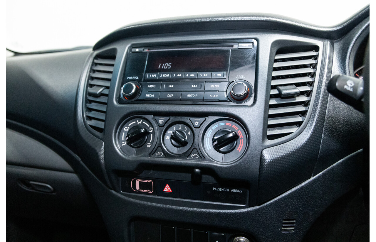 10/2015 Mitsubishi Triton GLX (4x4) MQ MY16 Dual Cab Utility Metallic Silver Turbo Diesel 2.4L