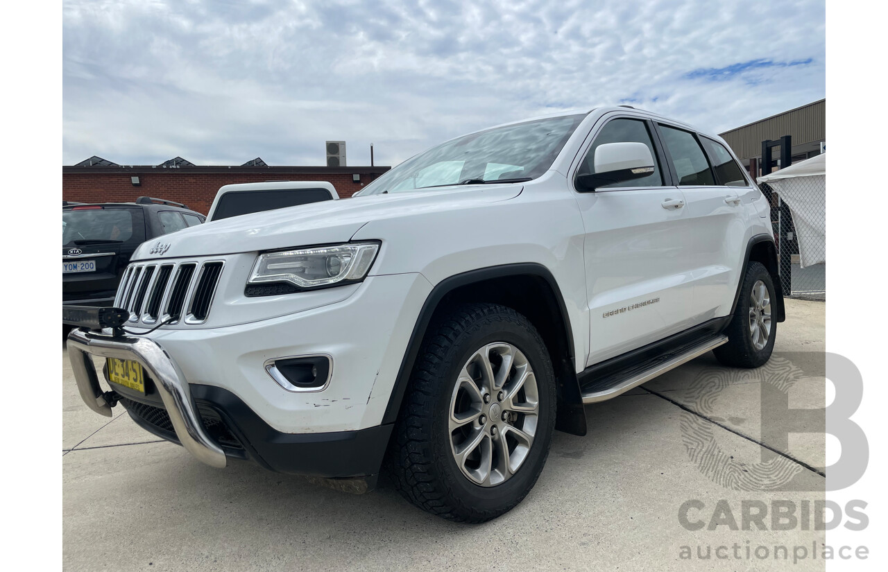 06/2015 Jeep Grand Cherokee LAREDO (4x4) 4x4 WK MY15 4D Wagon White 3.0L