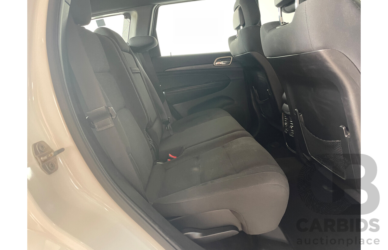 06/2015 Jeep Grand Cherokee LAREDO (4x4) 4x4 WK MY15 4D Wagon White 3.0L